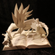 Illustration for article titled Storybook characters burst from their pages in these incredible paper sculptures